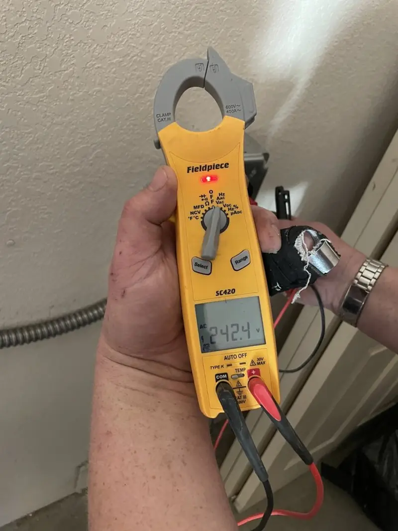 Voltage testing with clamp meter during Circuit Breaker Repair in Allegany